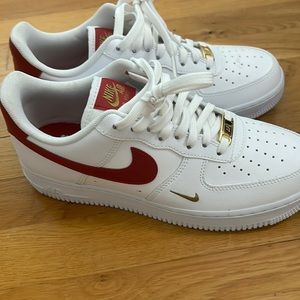 White and red Air Force Nikes